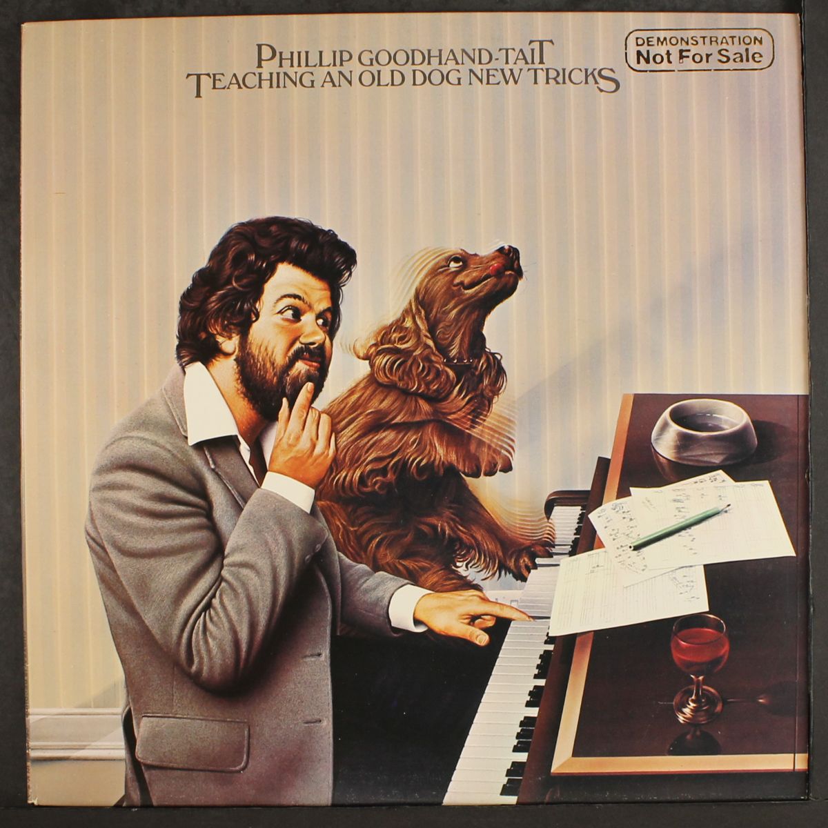 teaching an old dog new tricks by PHILLIP GOODHAND-TAIT