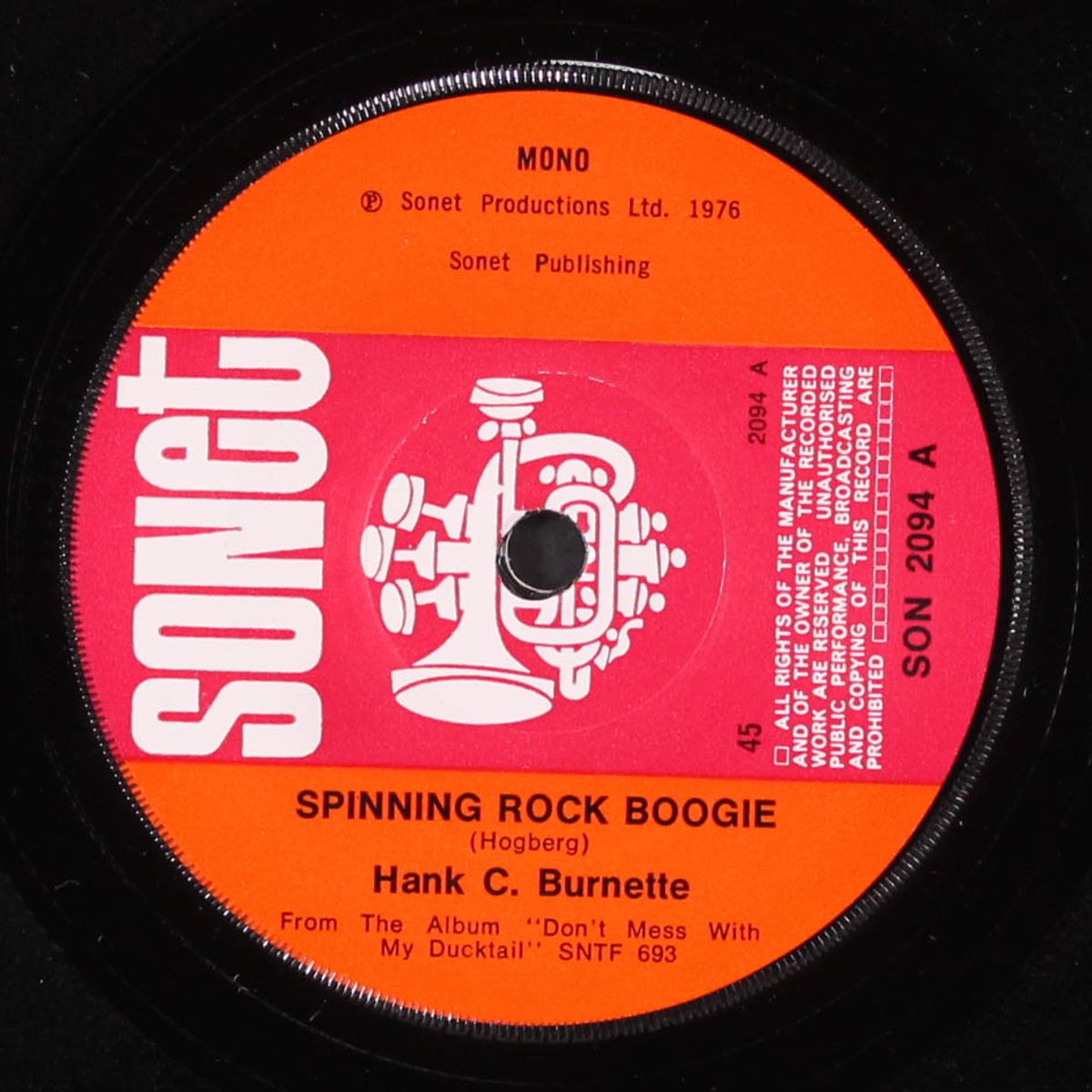 spinning rock boogie by HANK C. BURNETTE