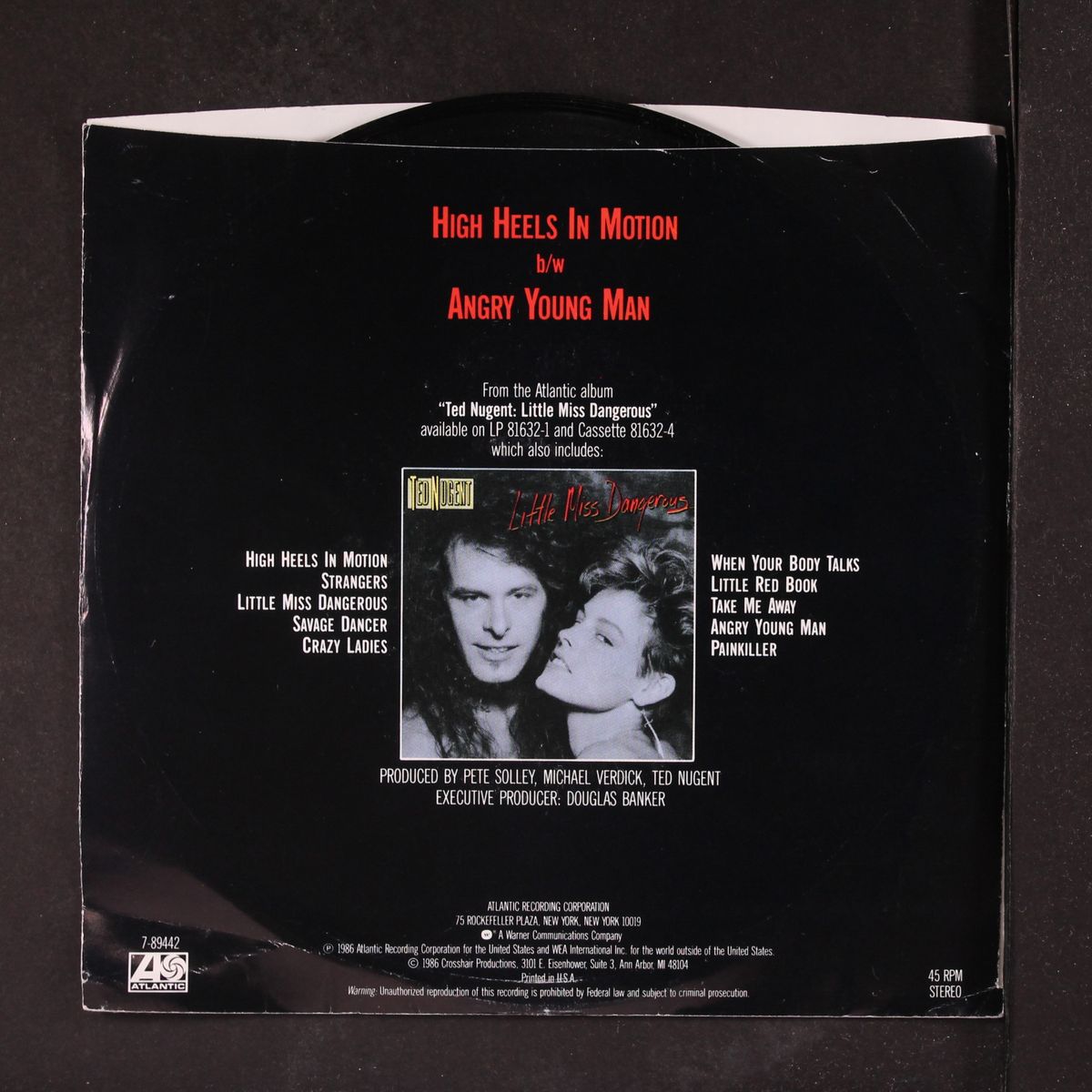 high heels in motion / same by TED NUGENT