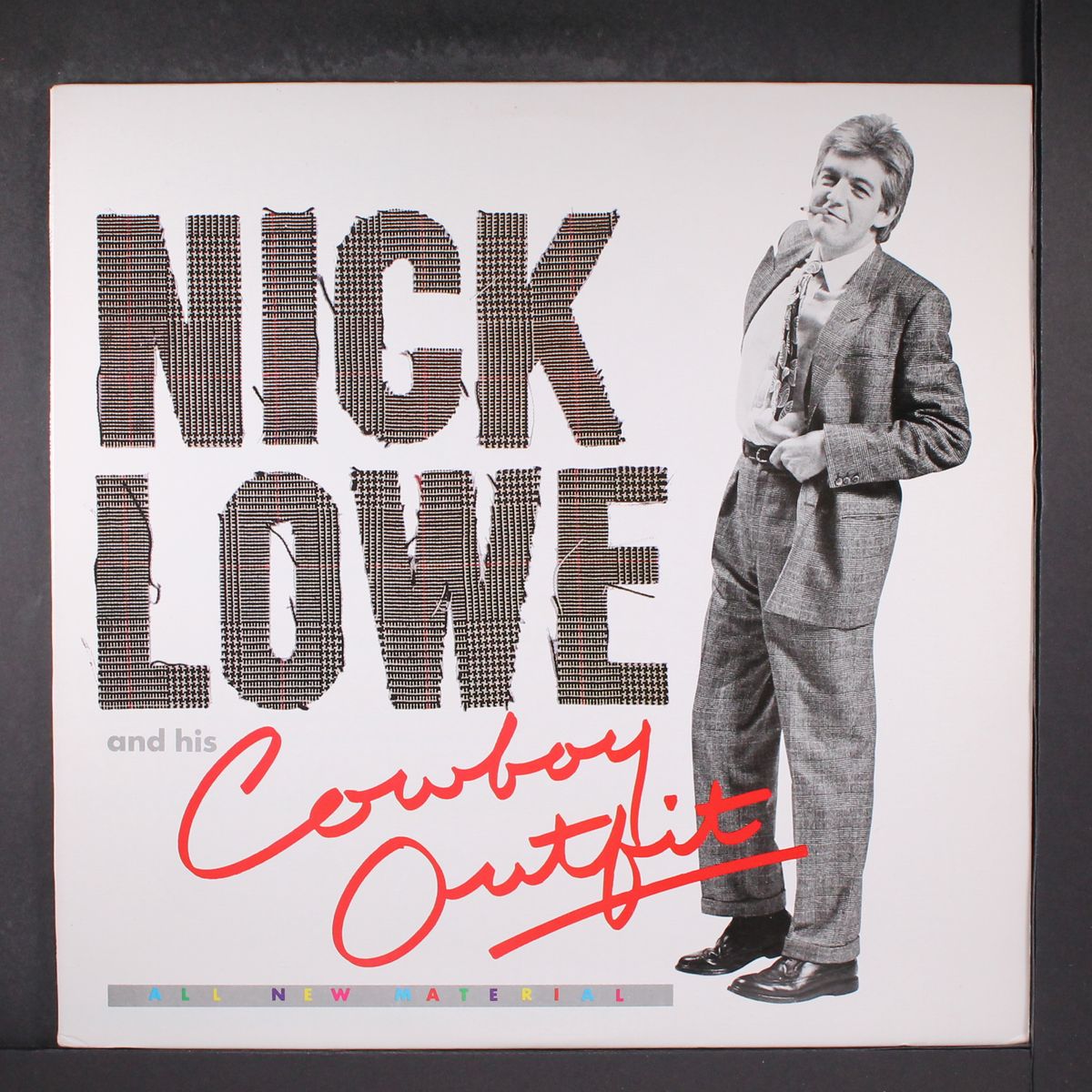 and his cowboy outfit by NICK LOWE