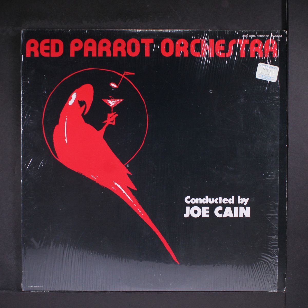 red parrot orchestra by JOE CAIN