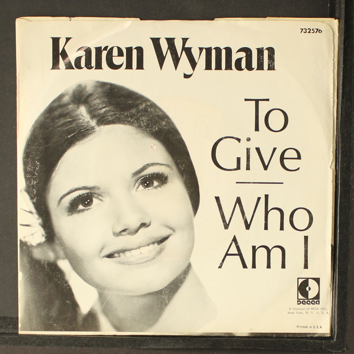 to give / who am i by KAREN WYMAN