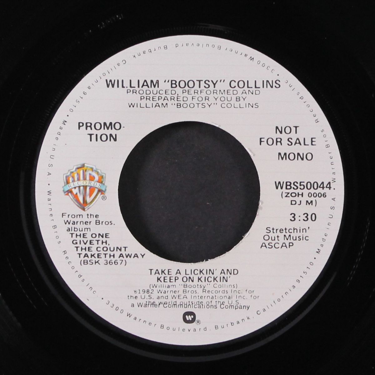 take a lickin' and keep on kickin' / mono by BOOTSY COLLINS