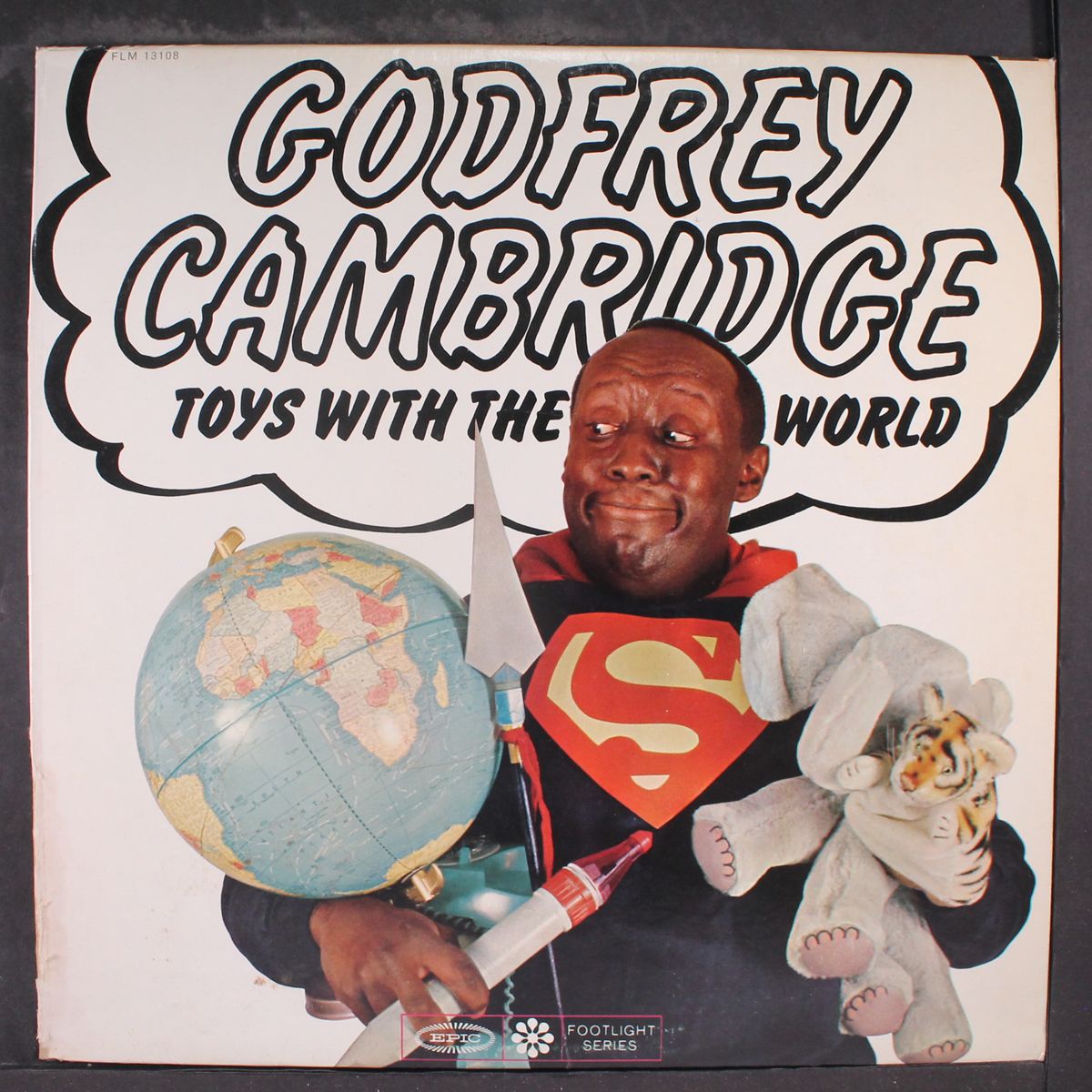 toys with the world by GODFREY CAMBRIDGE