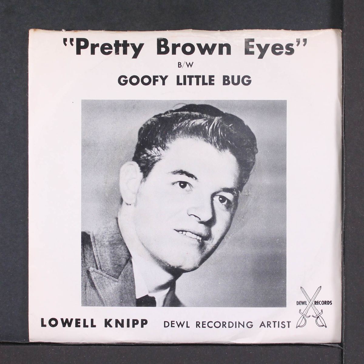 goofy little bug / pretty brown eyes by LOWELL KNIPP