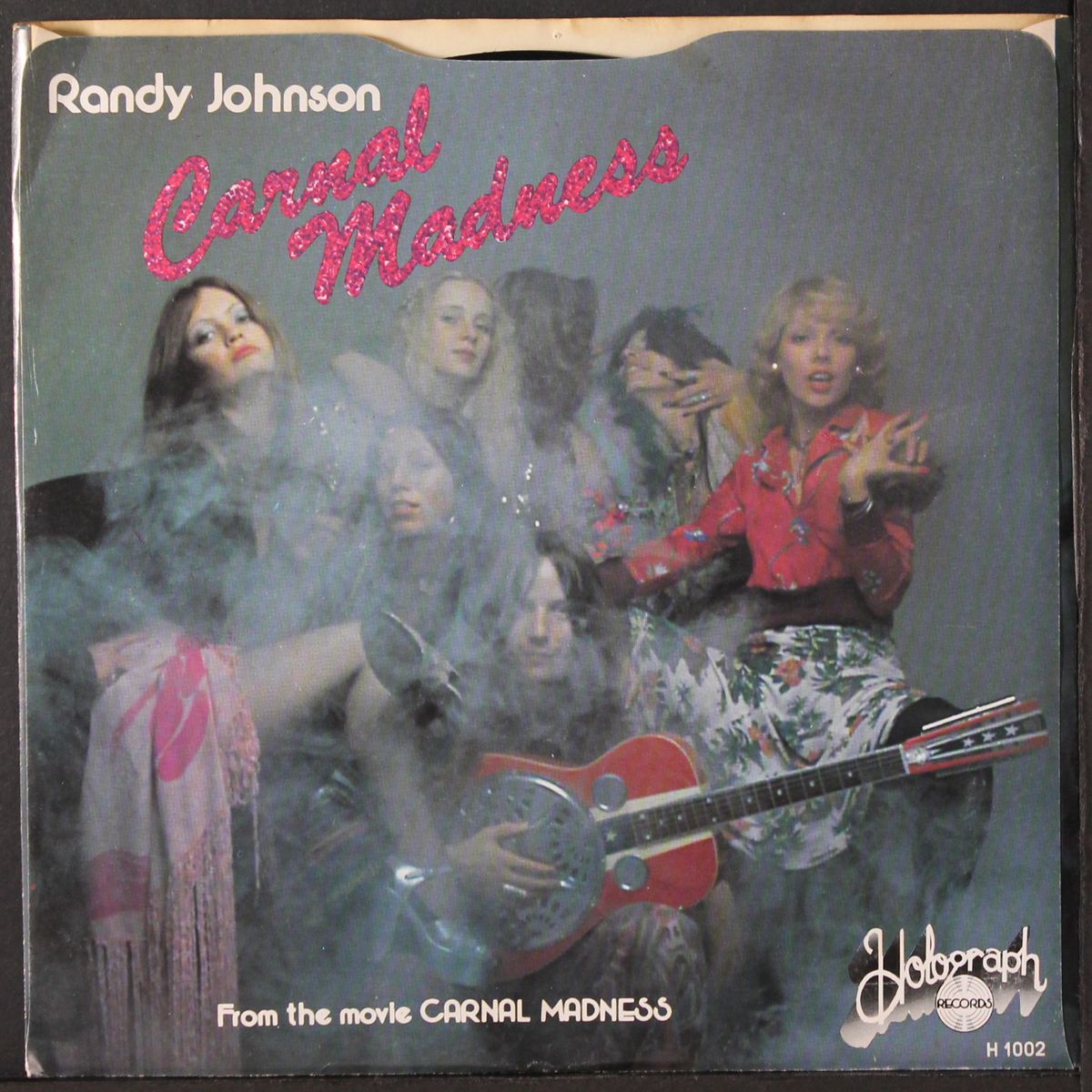 passions day / carnal madness by RANDY JOHNSON