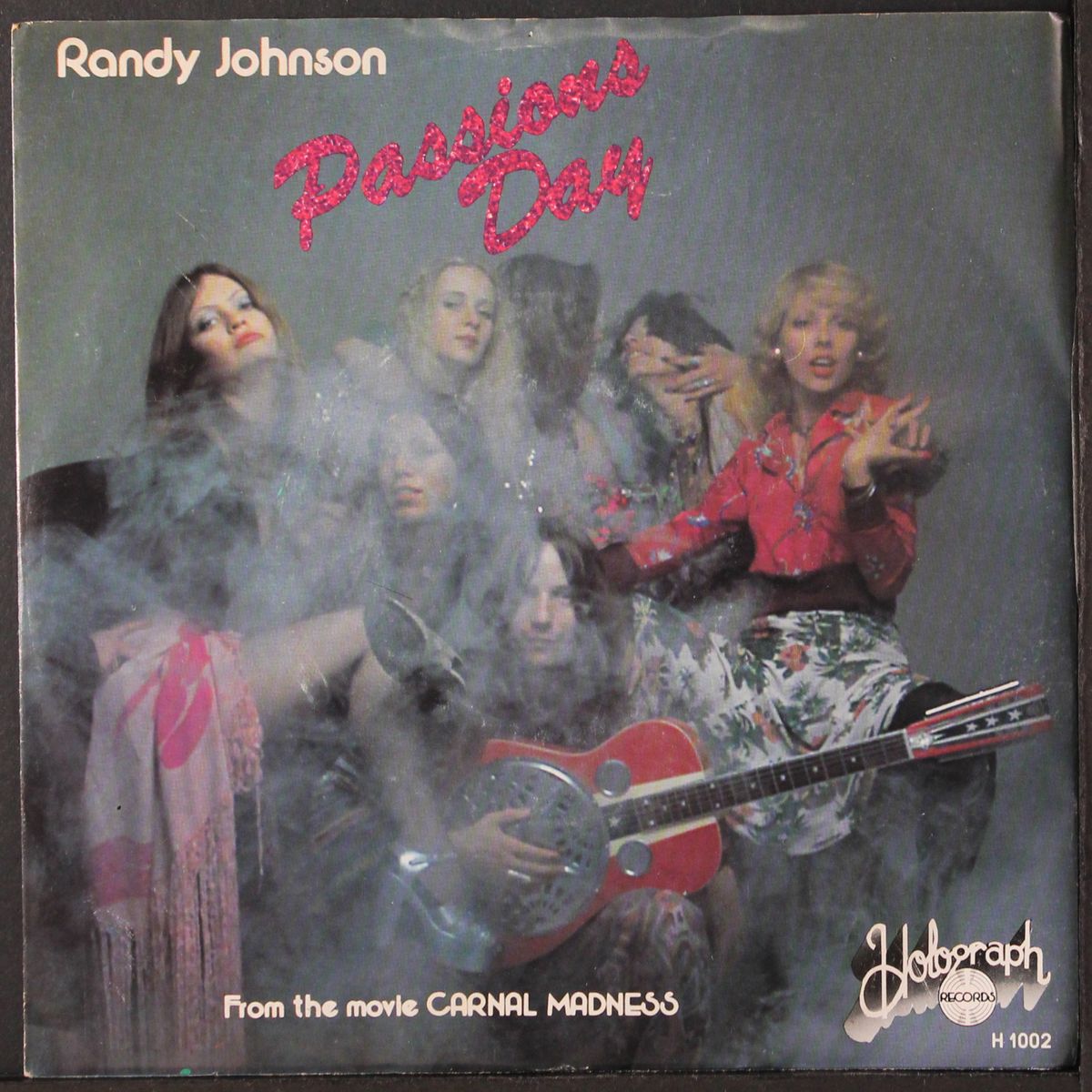 passions day / carnal madness by RANDY JOHNSON