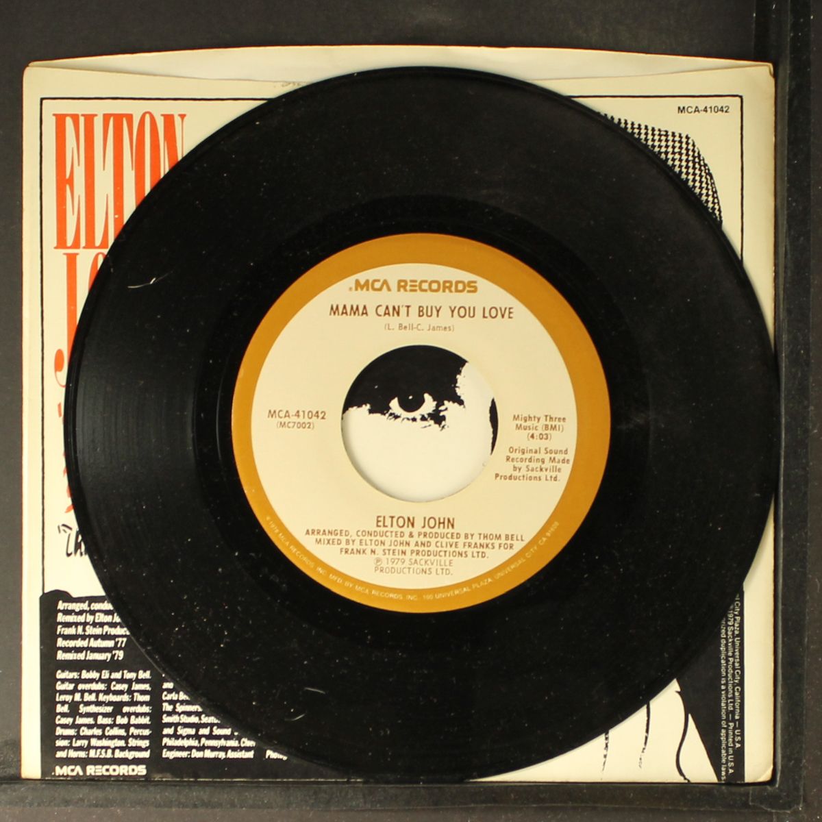 mama can't buy you love / three way love affair by ELTON JOHN