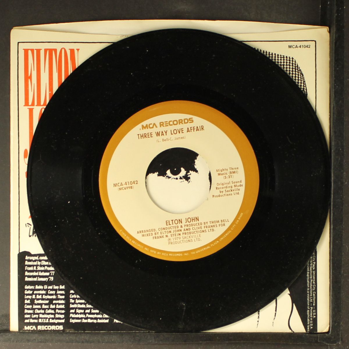 mama can't buy you love / three way love affair by ELTON JOHN