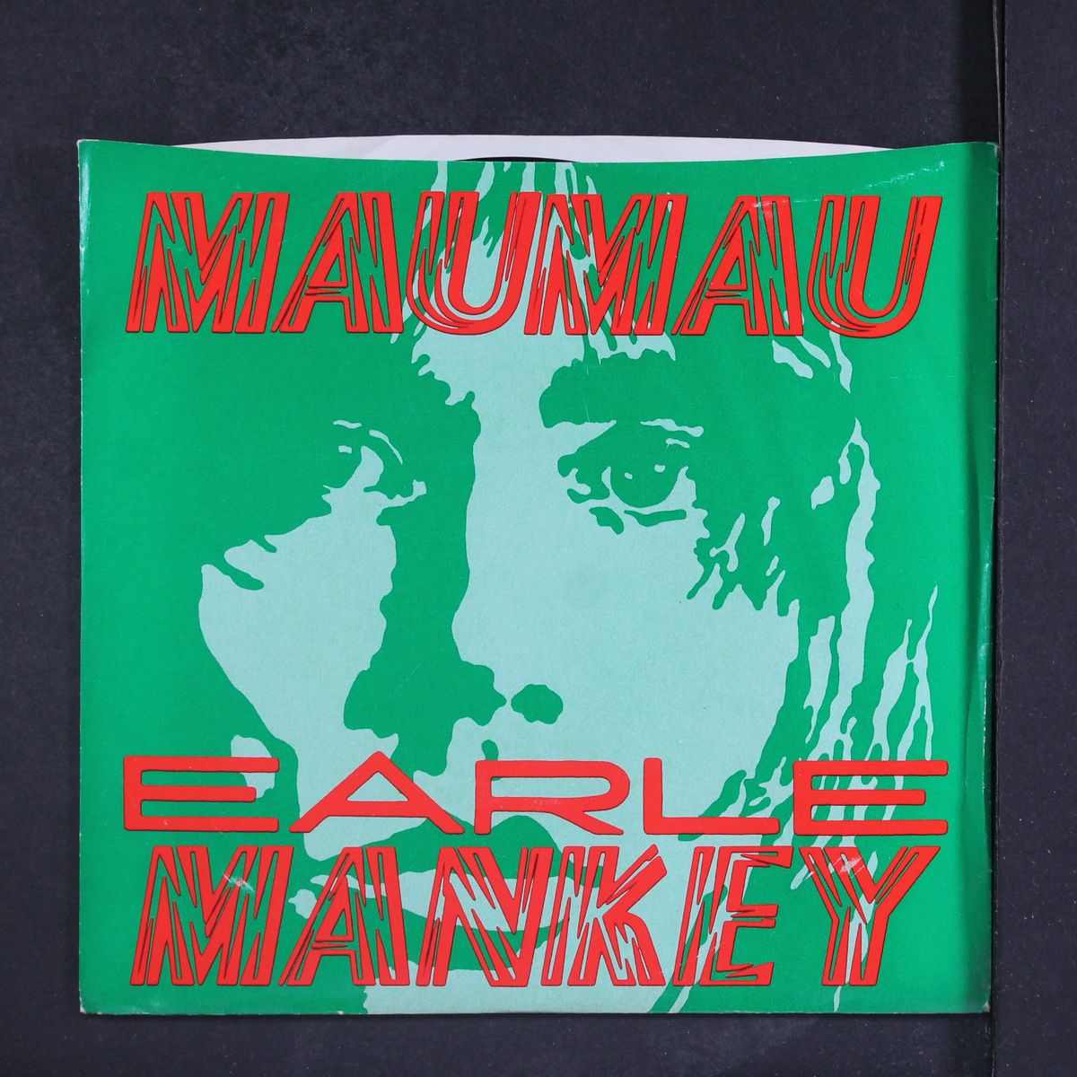 mau mau / crazy by EARLE MANKEY