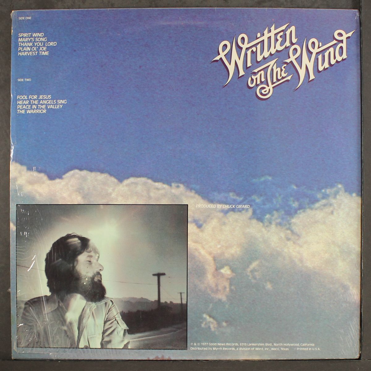 written in the wind by CHUCK GIRARD