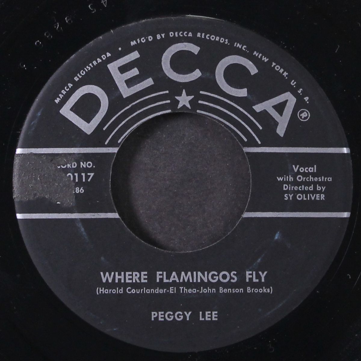 the gypsy with fire in his shoes / where flamingos fly by PEGGY LEE