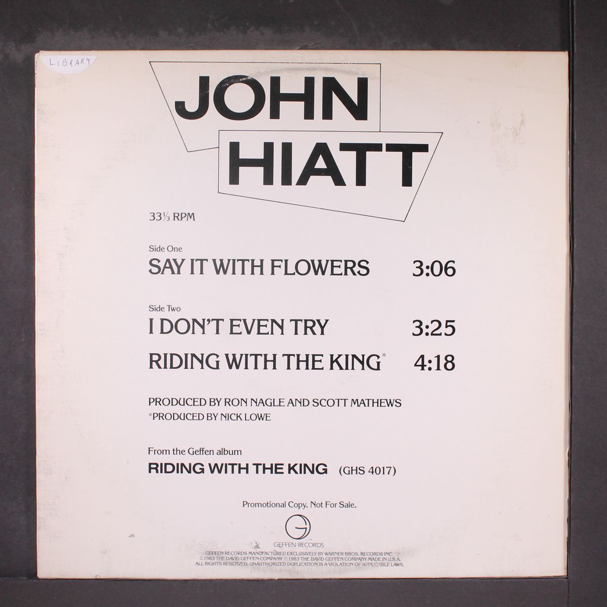 say it with flowers by JOHN HIATT