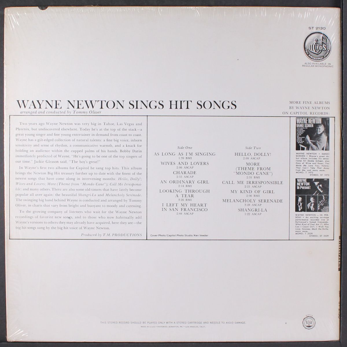 sings hit songs by WAYNE NEWTON
