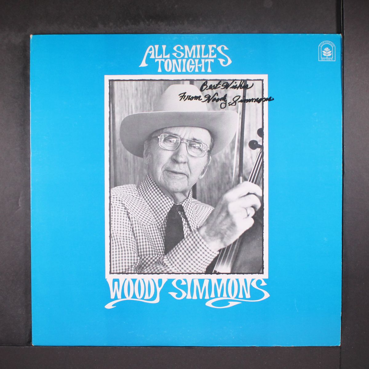 all smiles tonight by WOODY SIMMONS