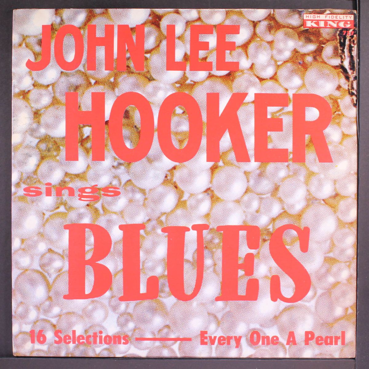 sings blues by JOHN LEE HOOKER