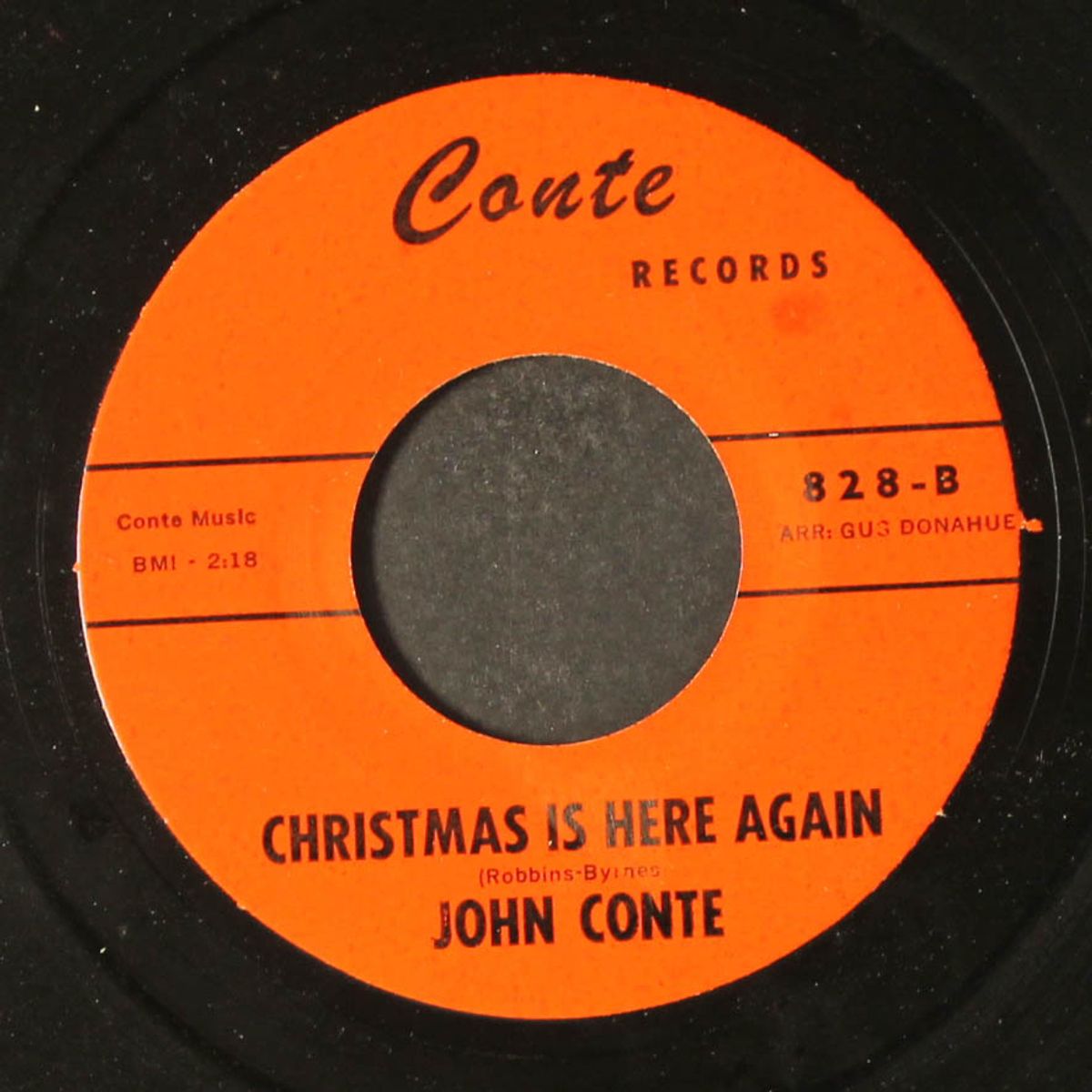 the gift / christmas is here again by JOHN CONTE