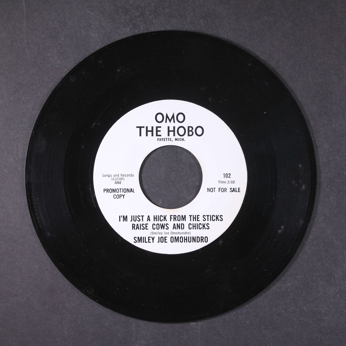 i'm just a hick from the sticks, raise cows and chicks / like a clap of thunder our love went asunder by SMILEY JOE OMOHUNDRO