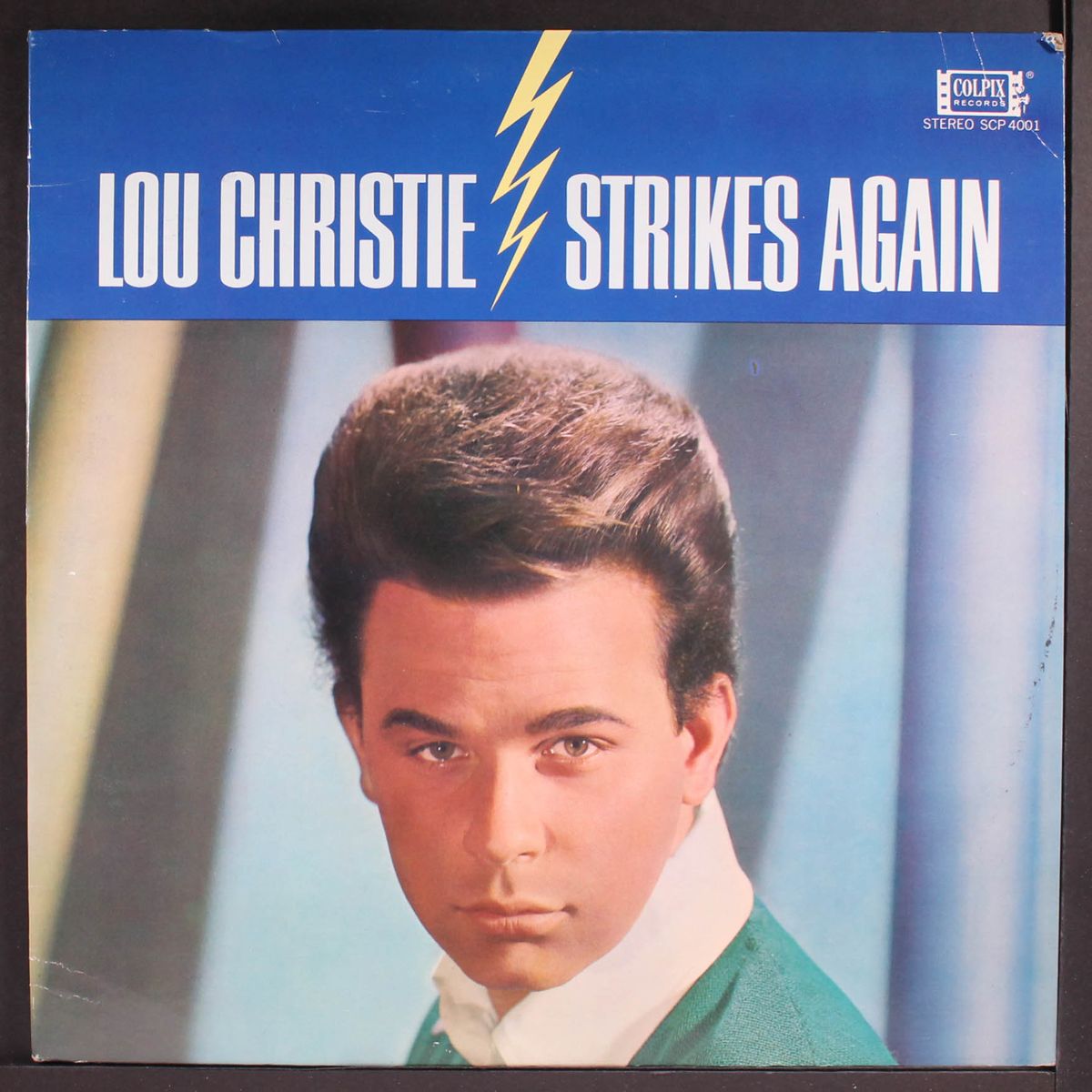 strikes again by LOU CHRISTIE