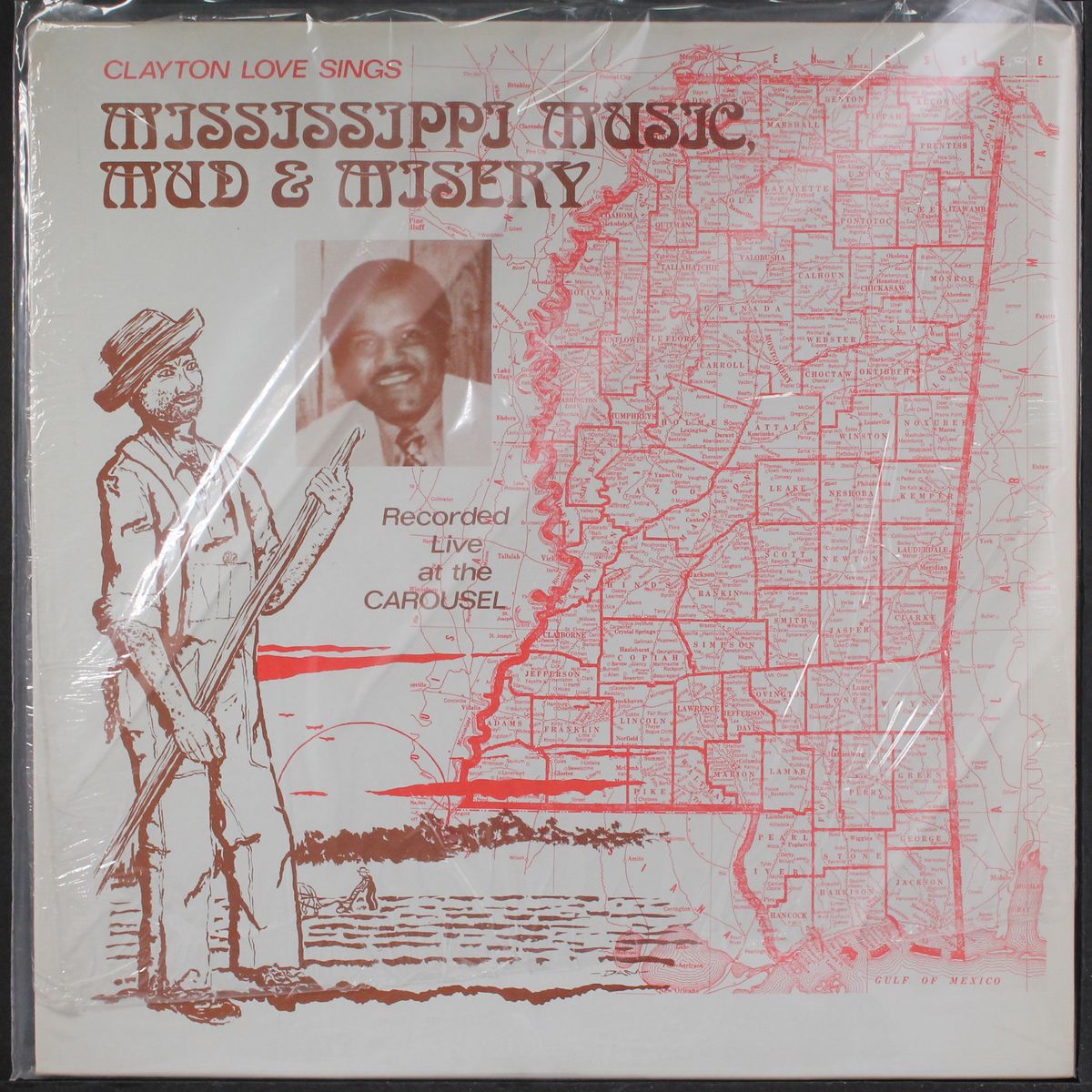 sings mississippi music, mud & misery by CLAYTON LOVE