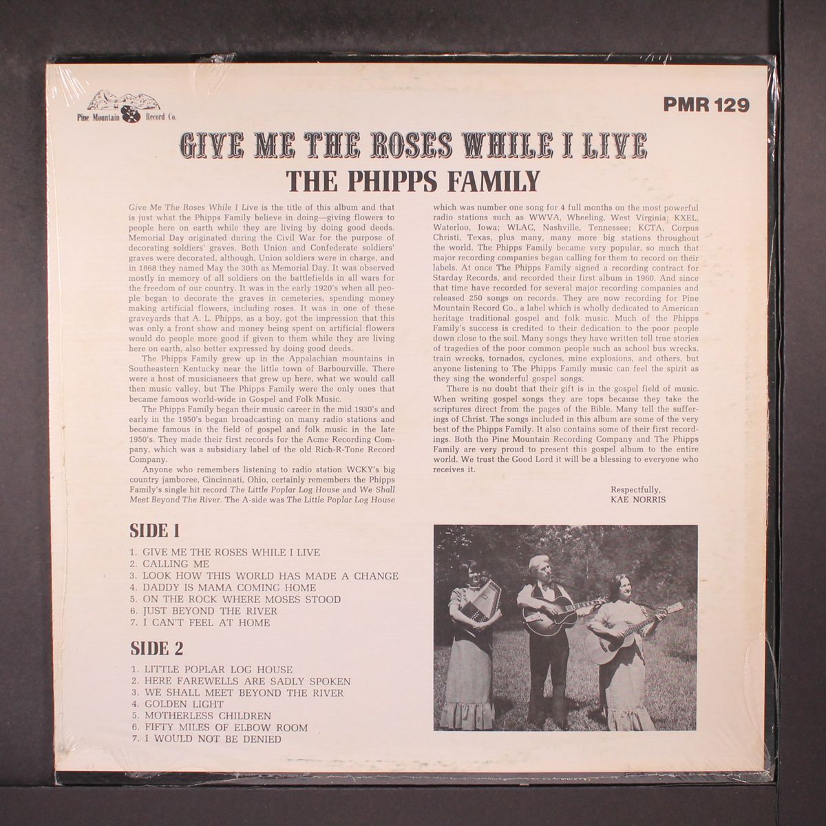 give me the roses while i live by PHIPPS FAMILY