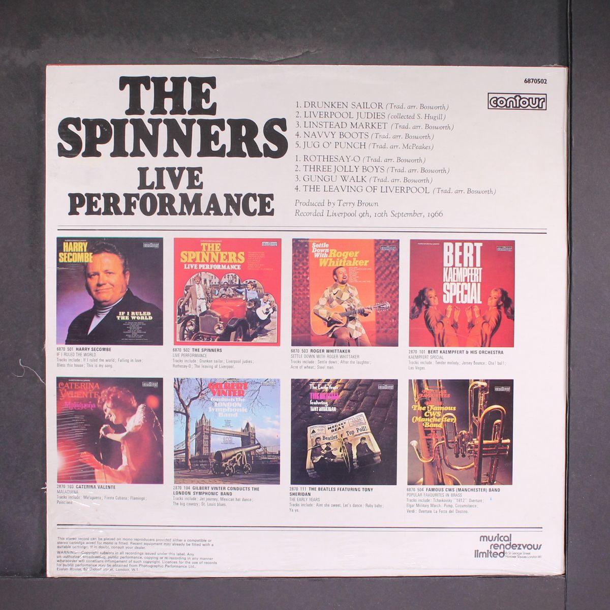 live performance by SPINNERS
