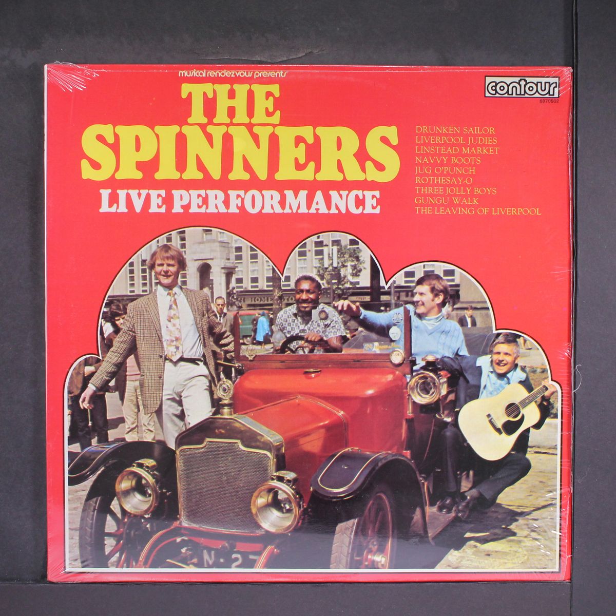 live performance by SPINNERS