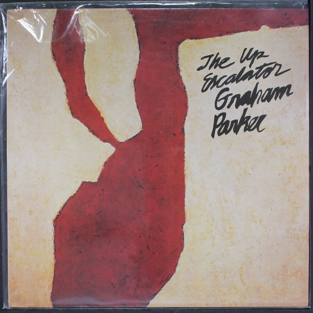 the up escalator by GRAHAM PARKER