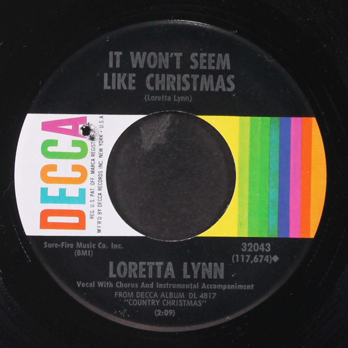 to heck with ole santa claus / it won't seem like christmas by LORETTA LYNN