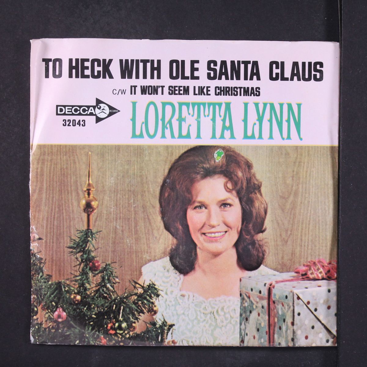 to heck with ole santa claus / it won't seem like christmas by LORETTA LYNN