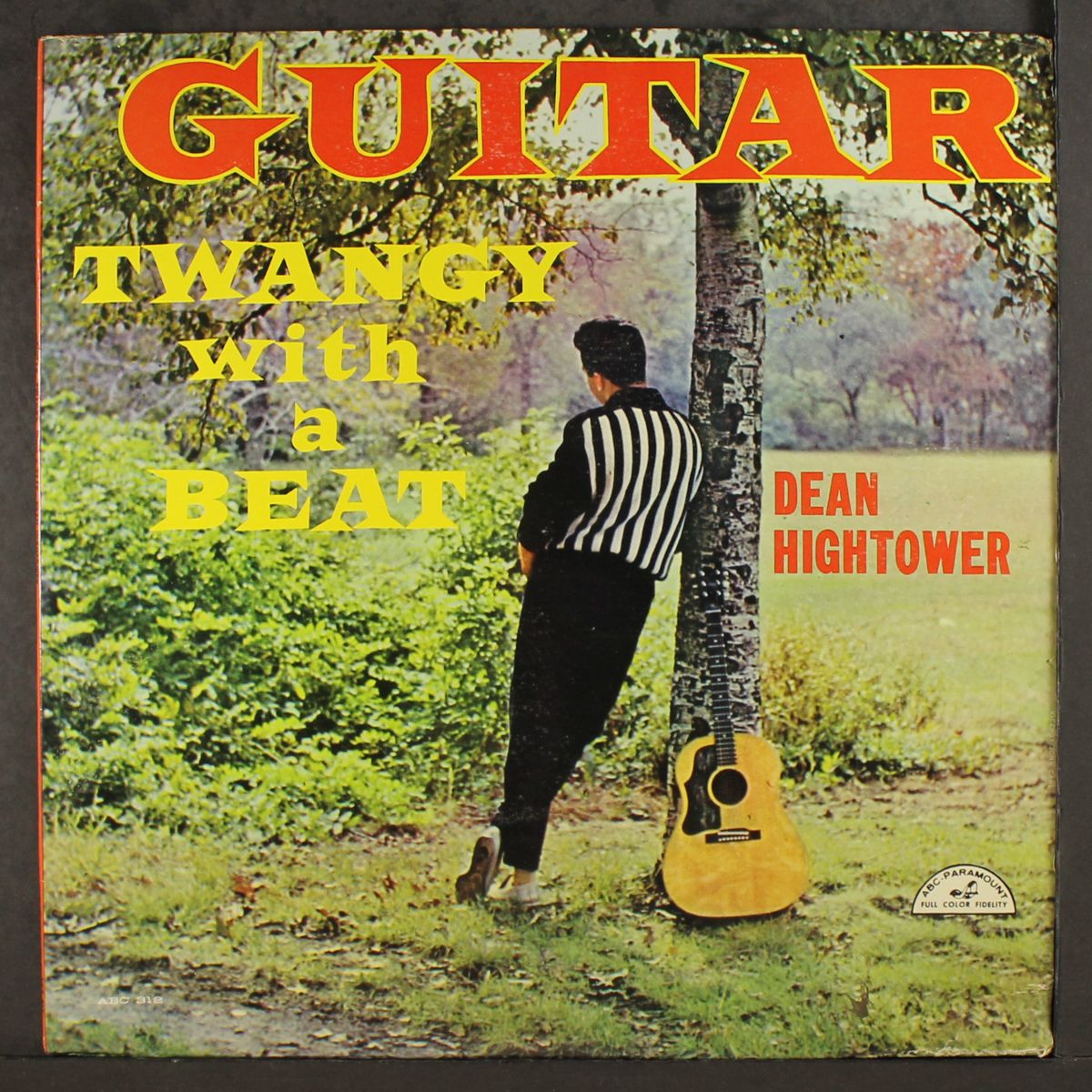guitar, twangy - with a beat by DEAN HIGHTOWER