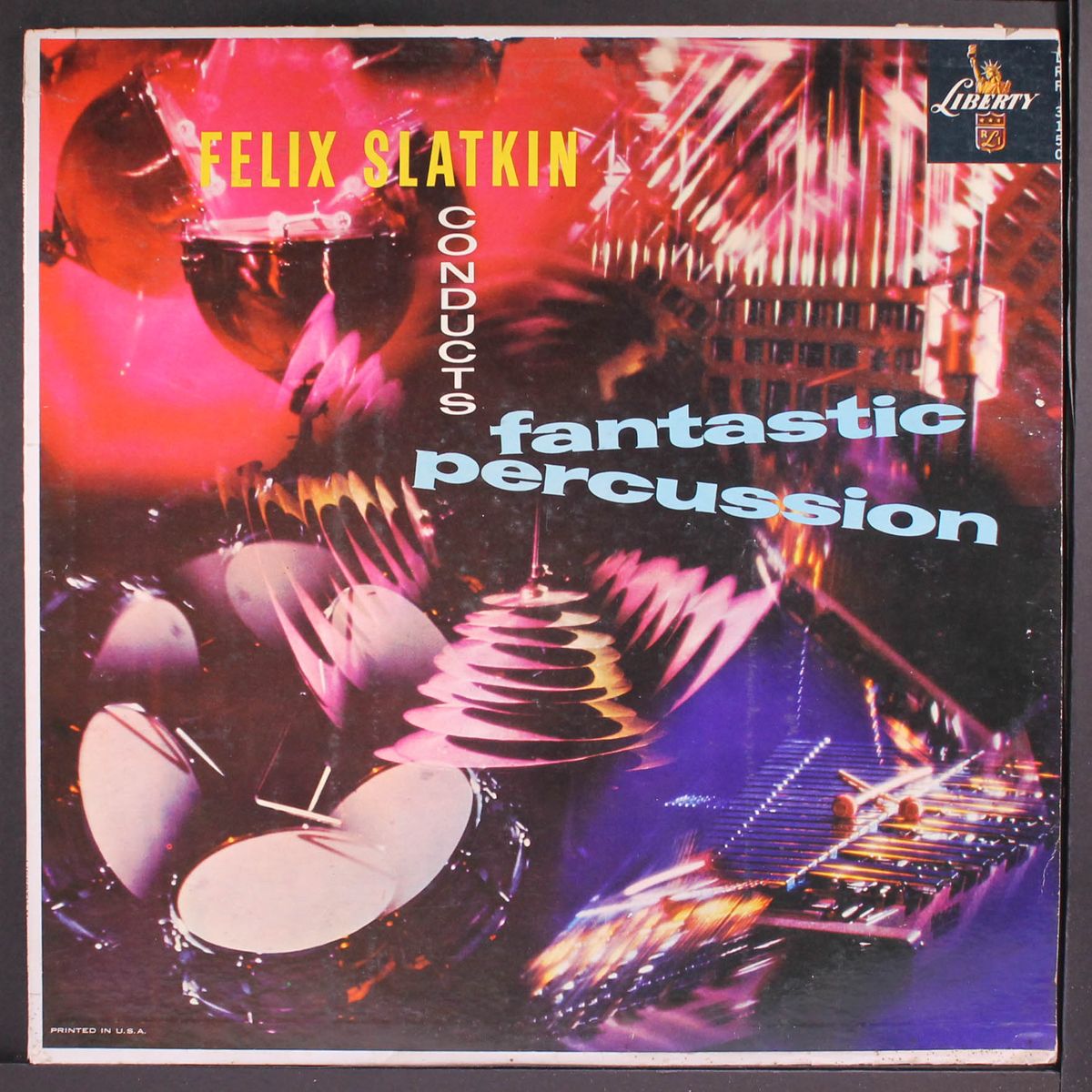 conducts fantastic percussion by FELIX SLATKIN