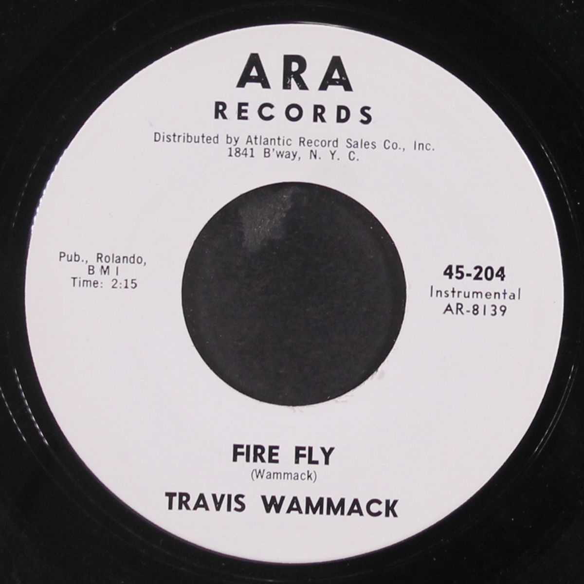scratchy / fire fly by TRAVIS WAMMACK