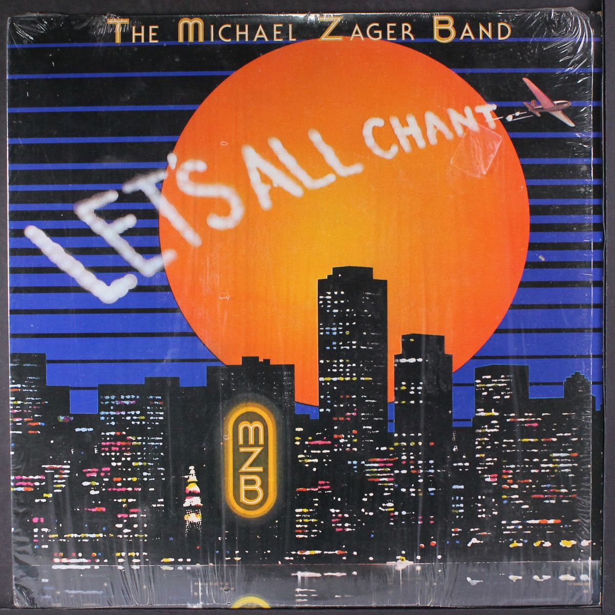 let's all chant by MICHAEL ZAGER BAND