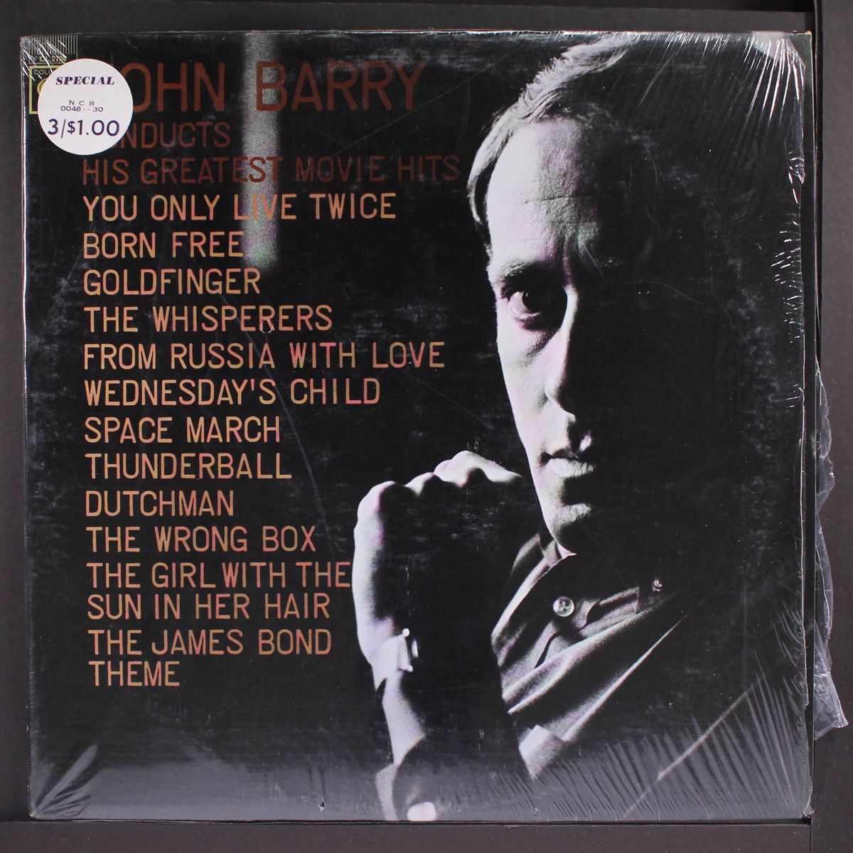 conducts his greatest movie hits by JOHN BARRY
