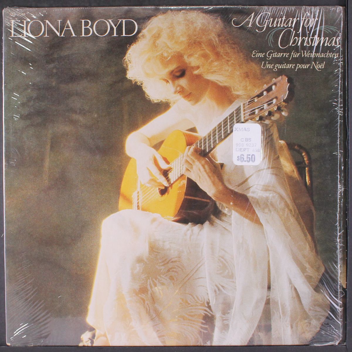 a guitar for christmas by LIONA BOYD
