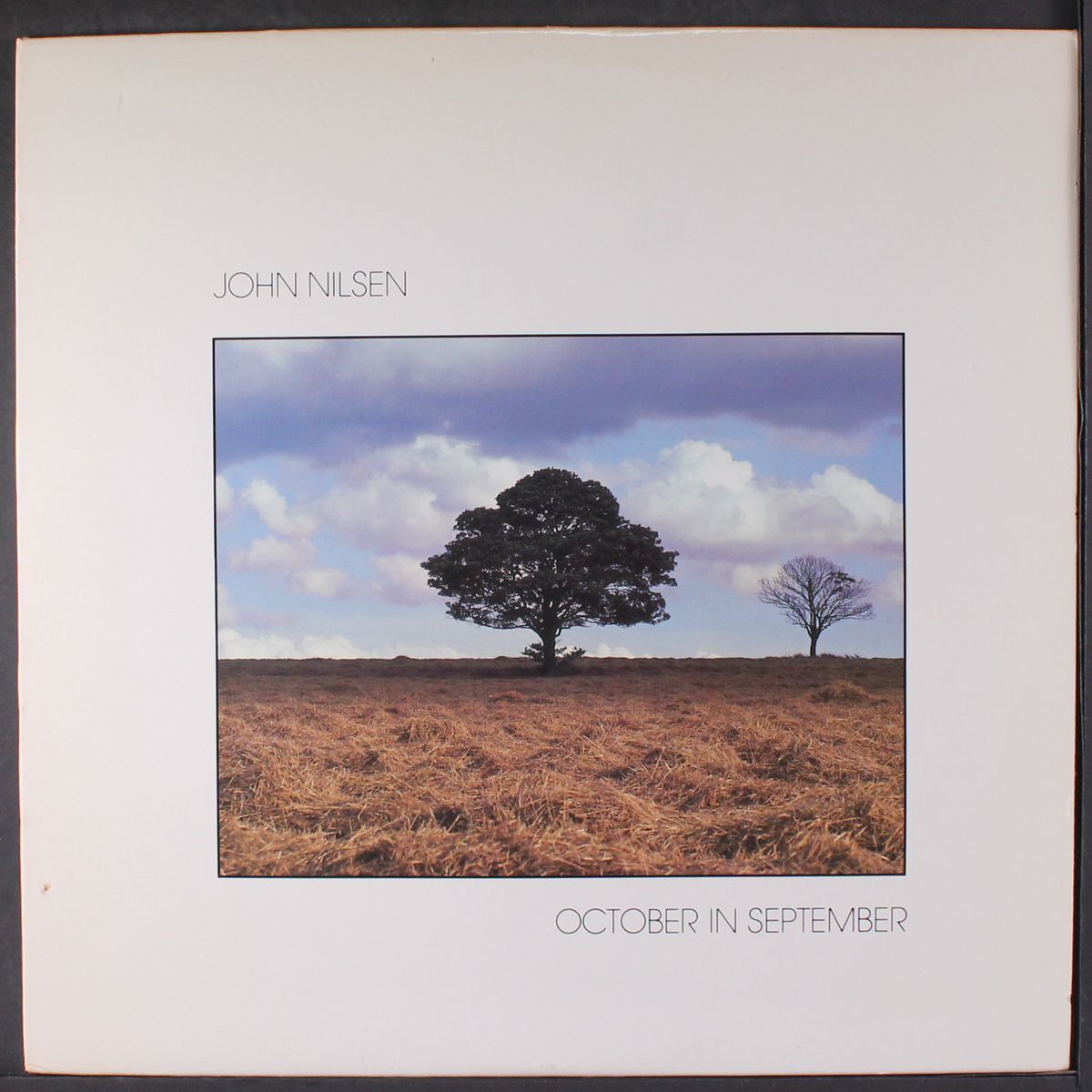 october in september by JOHN NILSEN
