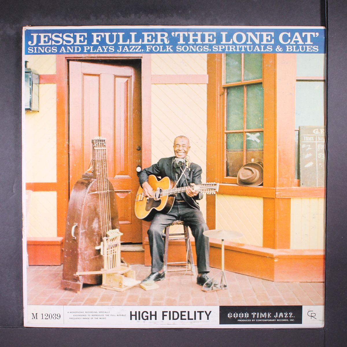 the lone cat by JESSE FULLER