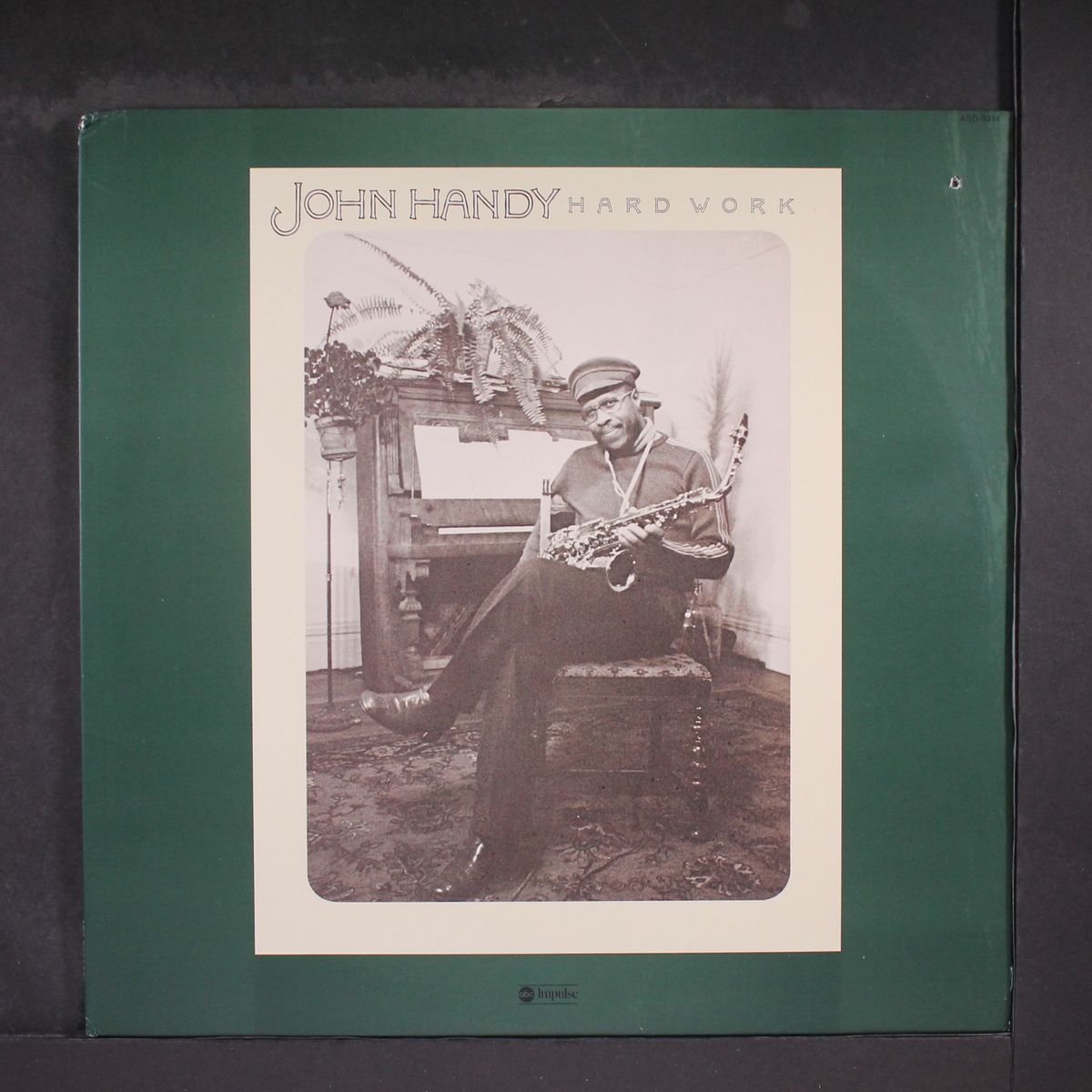 hard work by JOHN HANDY
