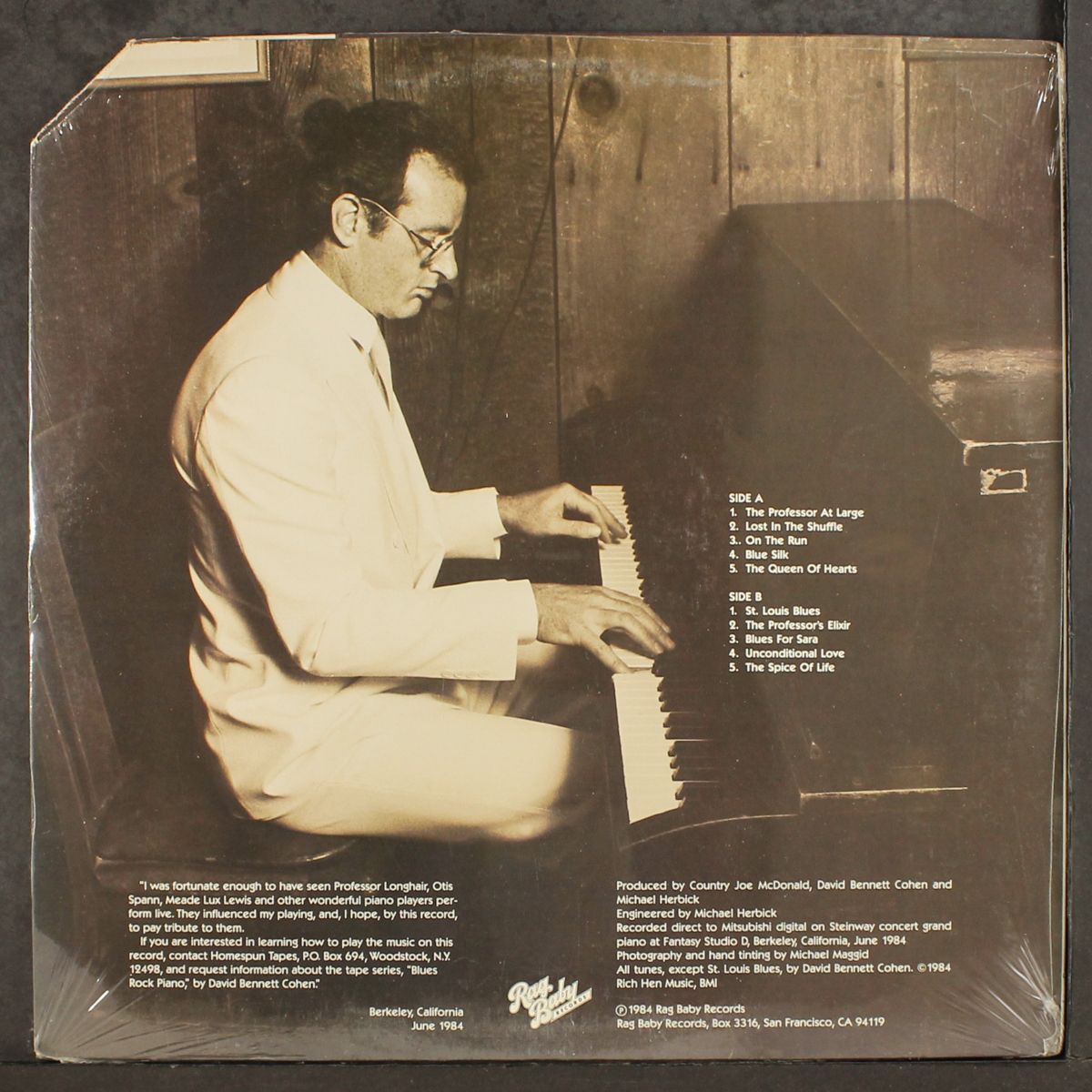 at the piano by DAVID COHEN