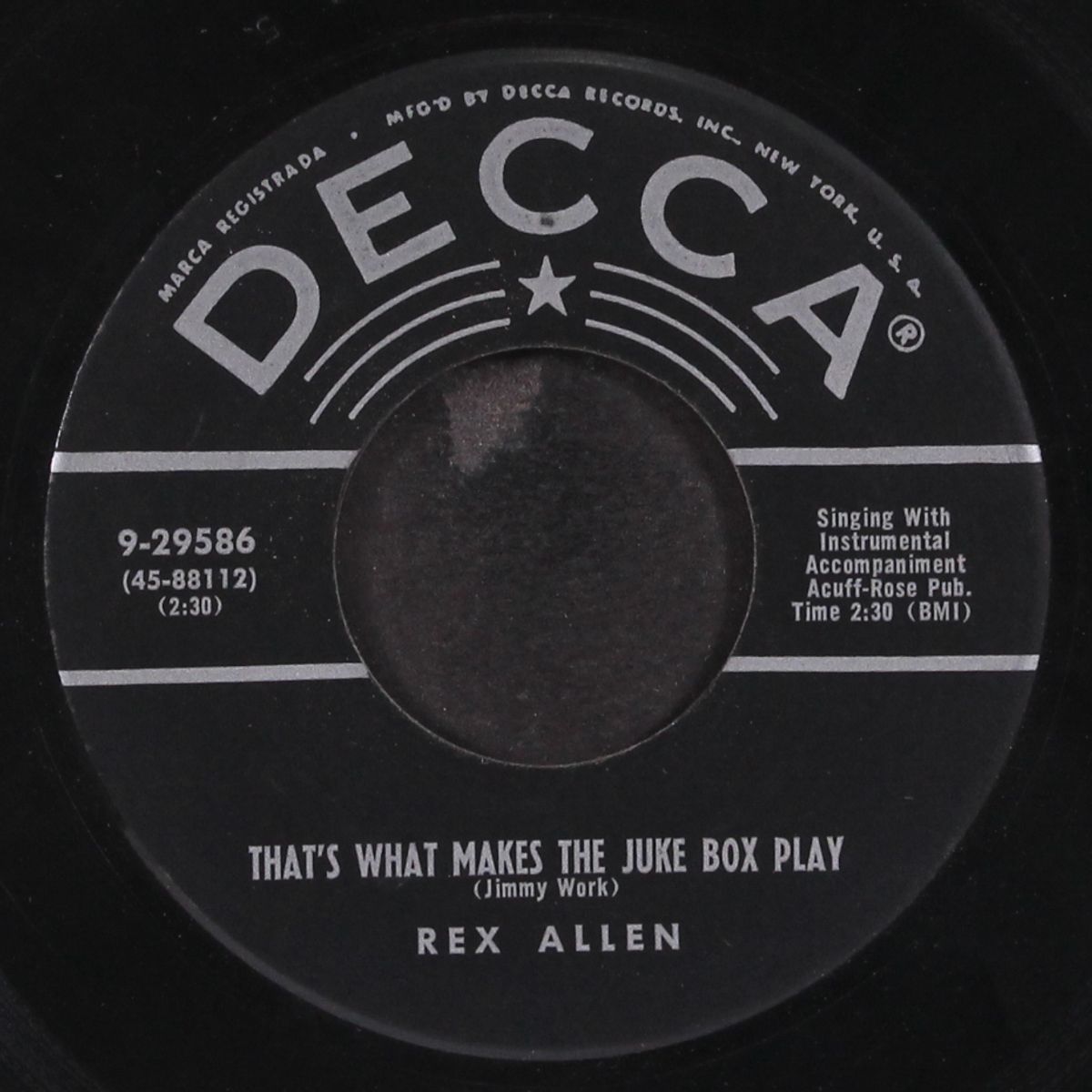 that's what makes the juke box play by REX ALLEN