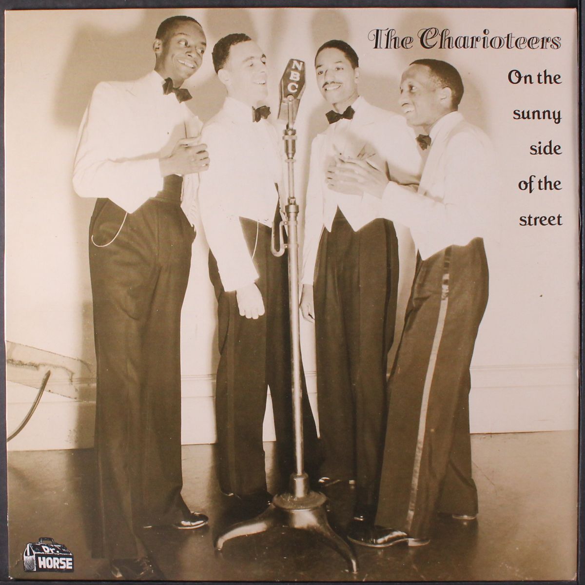 on the sunny side of the street by CHARIOTEERS