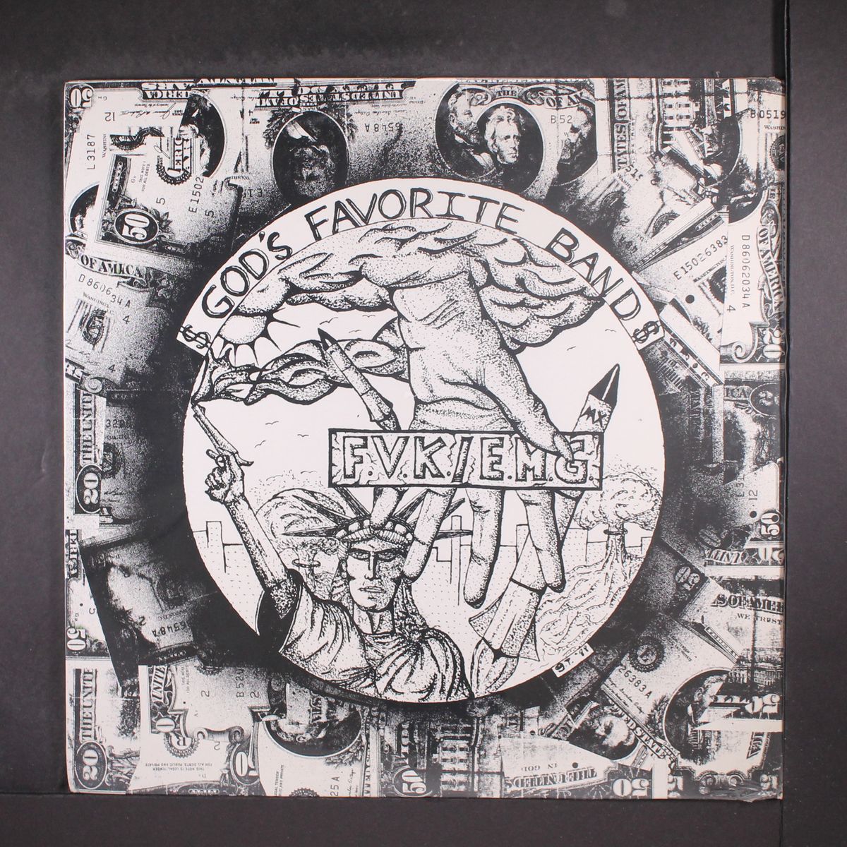 f.v.k. / e.m.g. by GOD'S FAVORITE BAND