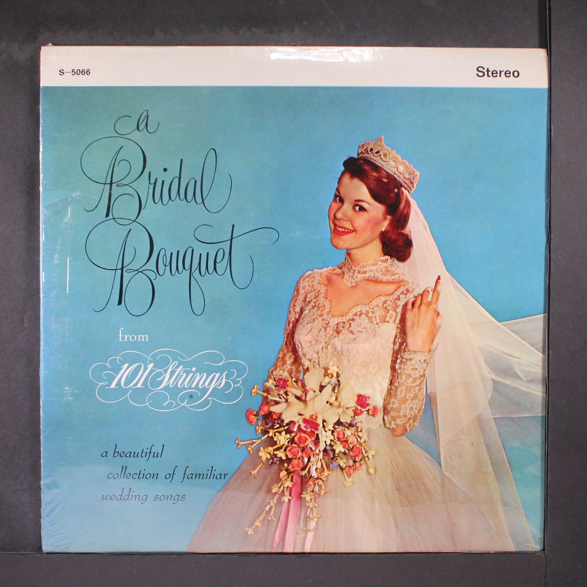 a bridal bouquet by 101 STRINGS