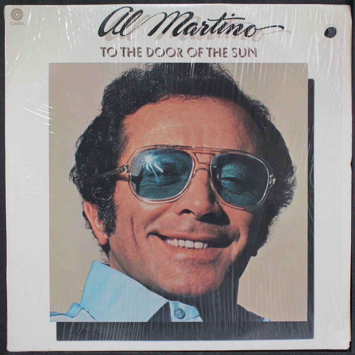 to the door of the sun by AL MARTINO