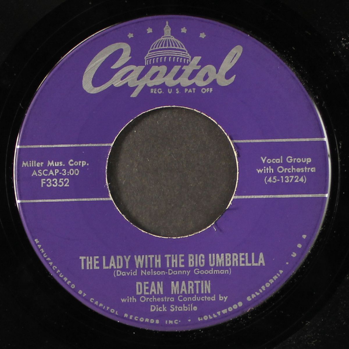 the lady with the big umbrella by DEAN MARTIN