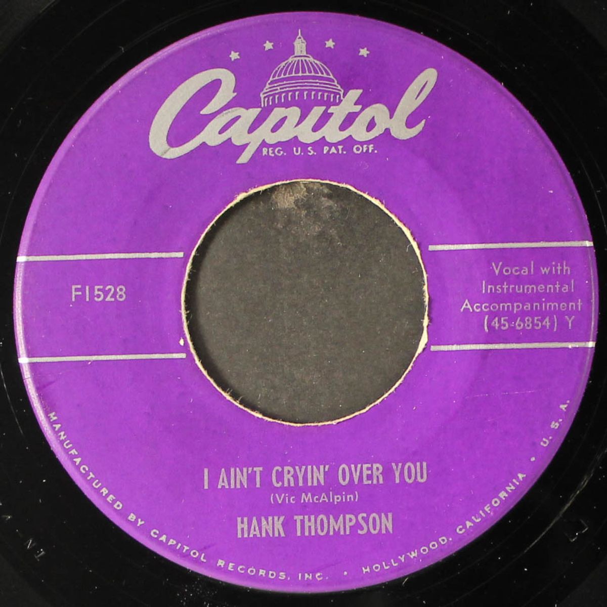 i ain't cryin' over you / hangover heart by HANK THOMPSON