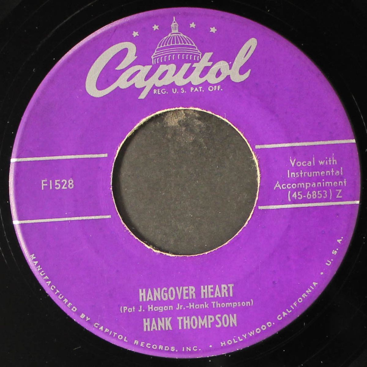 i ain't cryin' over you / hangover heart by HANK THOMPSON