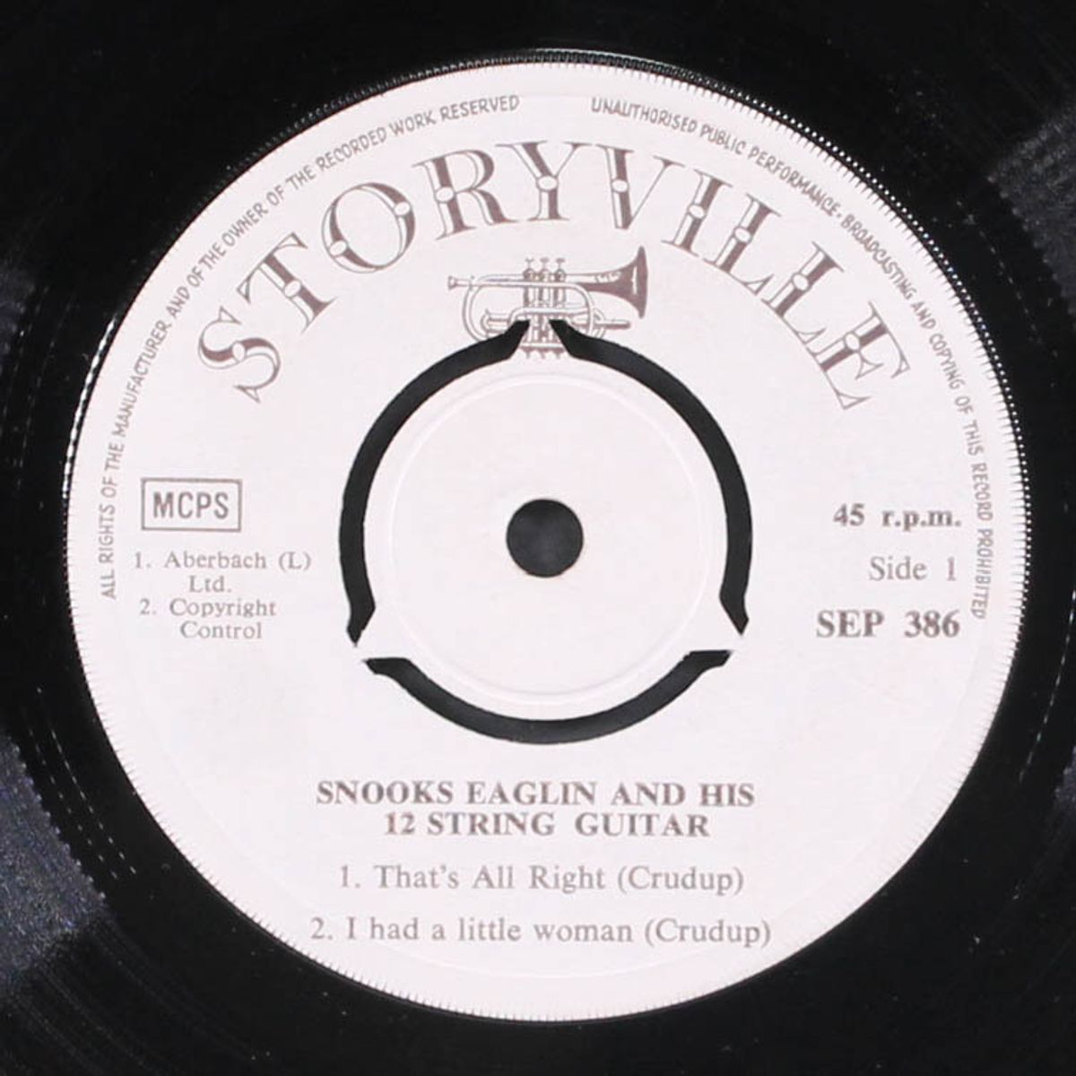 and his 12 string guitar by SNOOKS EAGLIN