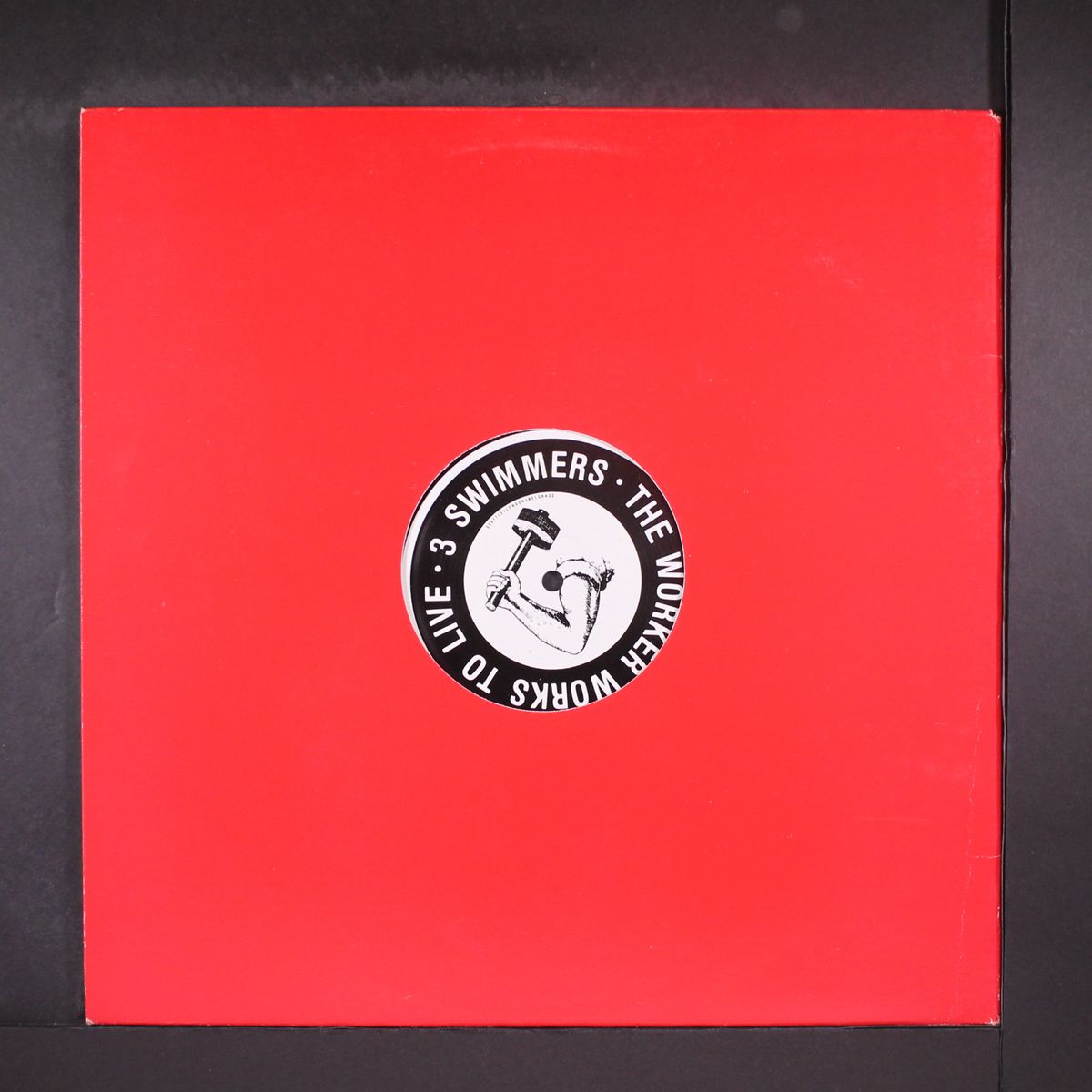 the worker works to live / take me back / behind the door by 3 SWIMMERS